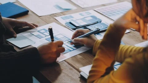 Web design process. The web designer creating a mockup of the mobile applic.. Stock Footage 291610815