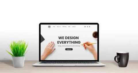 Web design studio concept. Latop with modern, flat design agency web page on  Stock Photos