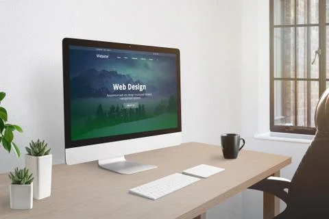 Web design studio office concept. Computer display with web presentation on d Foto stock