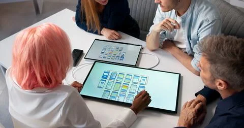 Web Designer And Developer Collaborates With Diverse Team Creating Digital In Stockfoto's