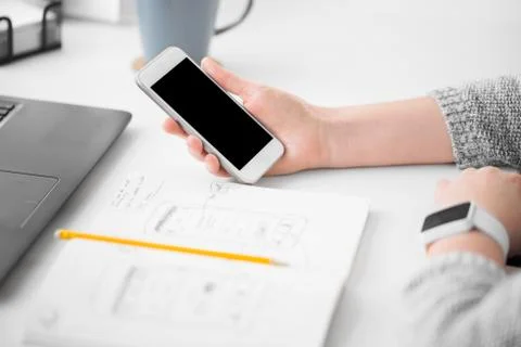 Web designer creating mobile user interface Foto stock