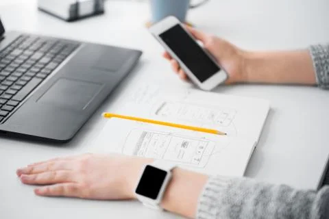 Web designer creating mobile user interface Stock Photos