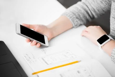 Web designer creating mobile user interface Stock Photos
