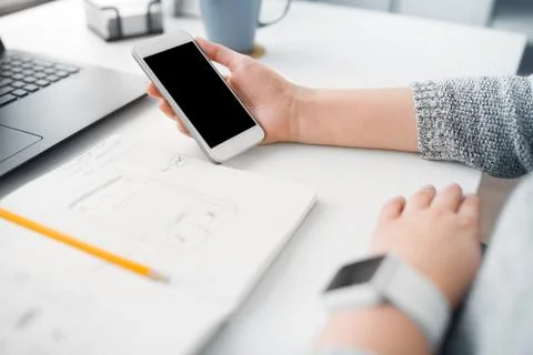 Web designer creating mobile user interface Stock Photos