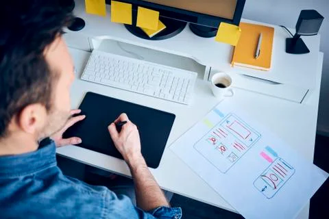 Web designer developing responsive website layout Stock Photos
