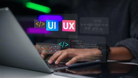 Web designer or programmer using laptop for UI/UX design and software devel.. 스톡 사진