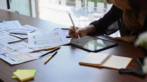 Web designer sketch planning application process development prototype wireframe Stock Photos