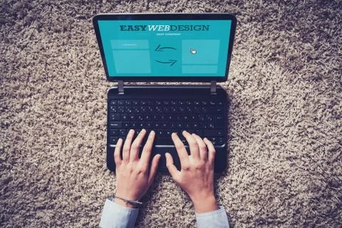 Web designer top view while working on the floor Stock Photos