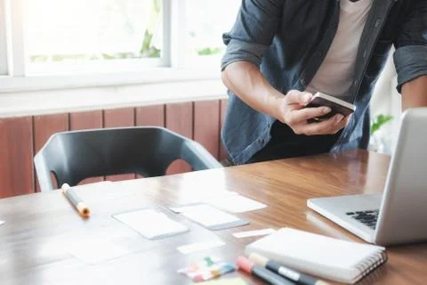Web designer, UX UI designer planning application for mobile phone 스톡 사진