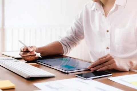 Web designer, UX UI designer designing mobile application user interface. Stock Photos