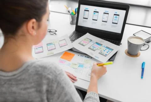 Web designer working on user interface at office Stockfoto's