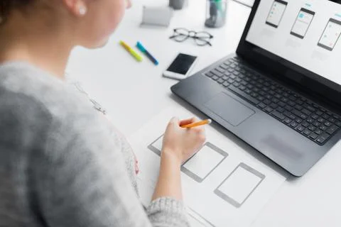 Web designer working on user interface at office 스톡 사진