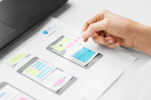 Web designer working on user interface wireframe Stock Photos