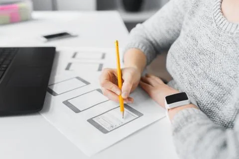 Web designer working on user interface at office Stock Photos