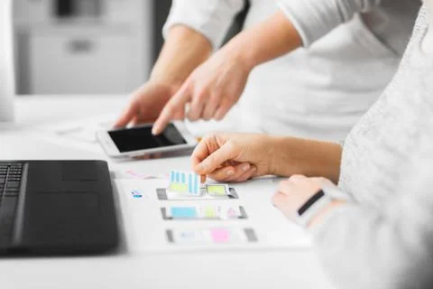 Web designers creating mobile user interface Stock Photos