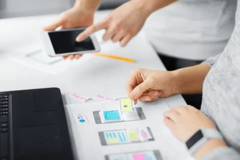 Web designers creating mobile user interface Stock Photos
