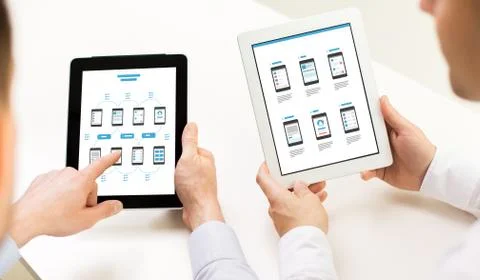 Web designers with user interface on tablet pc Stock Photos