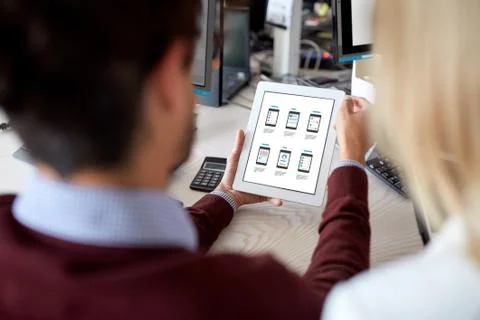 Web designers with user interface on tablet pc Stock Photos