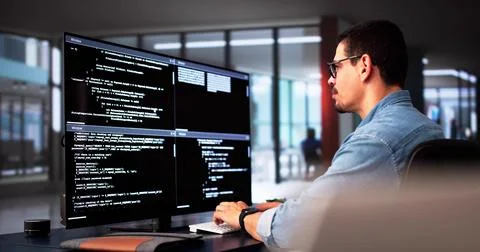 Web Developer Coding On Computer To Develop Code 스톡 사진