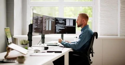 Web Developer Coding On Computer Foto stock