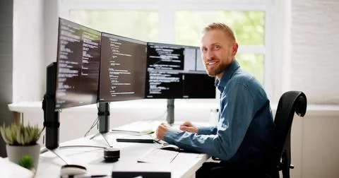 Web Developer Coding On Computer Stock Photos