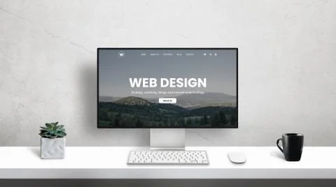 Web developer desk with computer display and web design page on it. Clean wor Foto stock