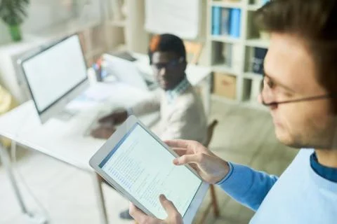 Web Developer Holding Tablet Stock Photos