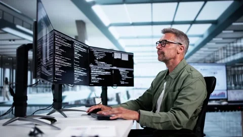 Web Developer Looking At Code Stock Footage 283697139