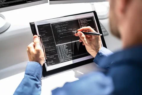 Web Developer Looking At Code 스톡 사진