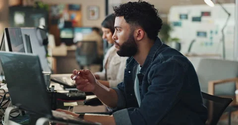 Web developer, man and technology in office with thinking of solution for Stock Footage 289824300