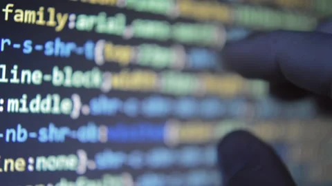 Web developer monitoring software code program on the laptop screen display. Stock Footage 235676189