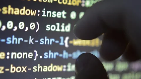 Web developer monitoring software code program on the laptop screen display. Stock Footage 235676287