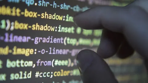 Web developer monitoring software code program on the laptop screen display. Stock Footage 235676382