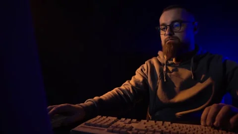 Web Developer or Programmer Working on PC Computer From 1980's in Dark Room Stock Footage 297875100