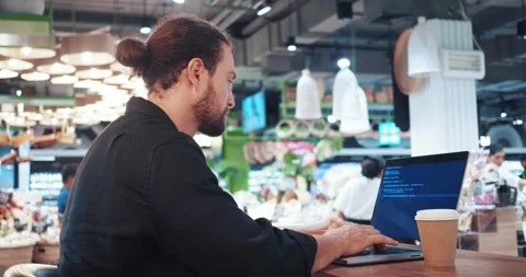 Web developer over the shoulder view. web developer crafting websites and web Stock Footage 253486051