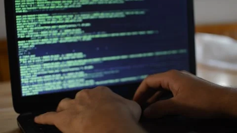 Web developer programming a software on his laptop. web laptop coding. Stock Footage 211633113