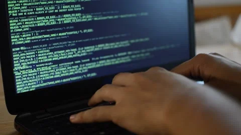 Web developer programming a software on his laptop. web laptop coding. Stock Footage 211633540