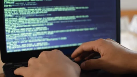 Web developer programming a software on his laptop. web laptop coding. Stock Footage 211633858