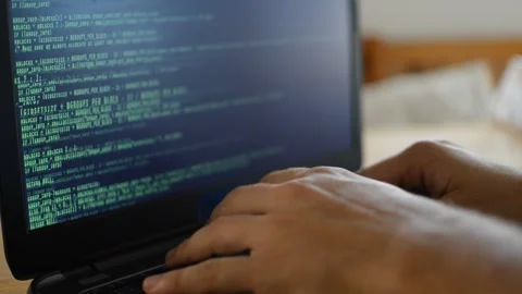 Web developer programming a software on his laptop. web laptop coding. Stock Footage 211634089