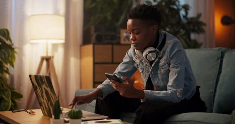 Web developer software engineer African woman typing with purpose on laptop Stock Footage 245190598