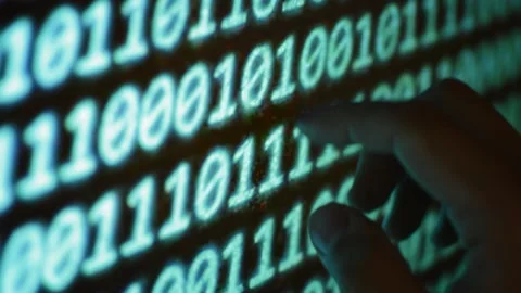 Web developer study binary code technology on the monitor of the computer Stock Footage 201145651