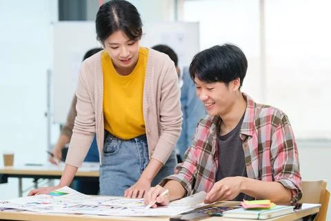 Web developer team are working about planning mobile application project to.. Stock Photos