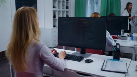 Web Developer Woman Working In Office, Professionals Programming And Developing Stock Footage 273981858
