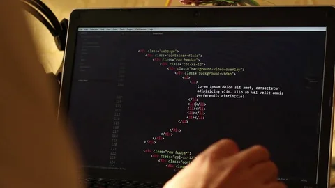 Web developer at work. Sketching HTML code Stock Footage 80809914