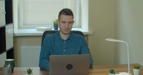 Web developer working at the computer. Stock Photos