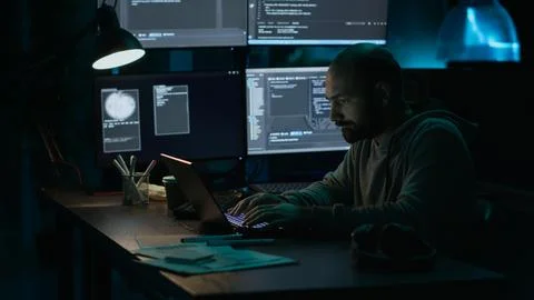 Web developer yawning and feeling exhausted late at night Foto stock