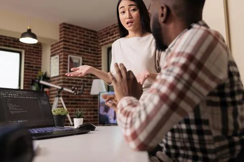 Web developers using digital terminal window Photos