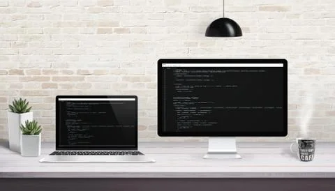 Web development on computer and laptop with concept of code editor on display Stock Photos