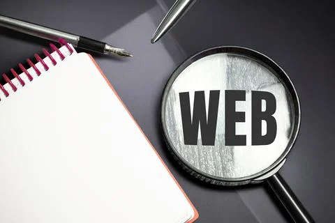 Web development concept Web word on magnifier. Development Stock Photos