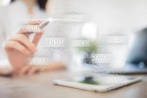 Web development tools concept on virtual screen. Programming language and Stock Photos